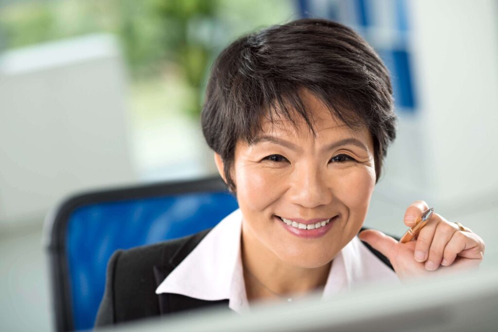 Close-up of smiling face of businesswoman