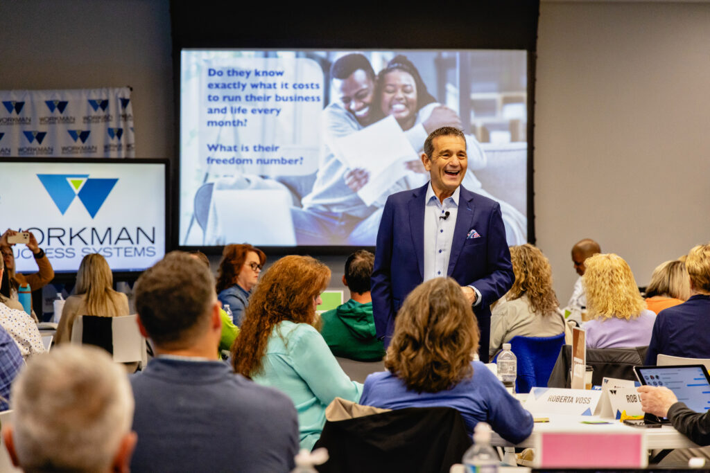 Verl Workman speaking at a coach training event